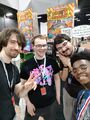 From left to right: PhantomArcade posing with EliteMasterEric, ninjamuffin99 and Tyler Bourke at the Too Many Games convention.