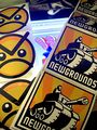 Stickers of the Newgrounds logo and Angry Faic partly covering a frame of an animation of Boyfriend falling.